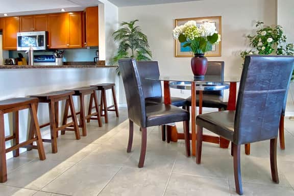 Coastal condo with multiple balconies and dock intracoastal waterway views