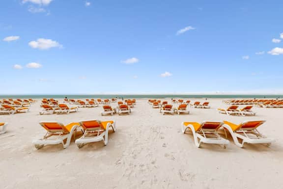 City View condo with beach access pools hot tub gym AC and WD
