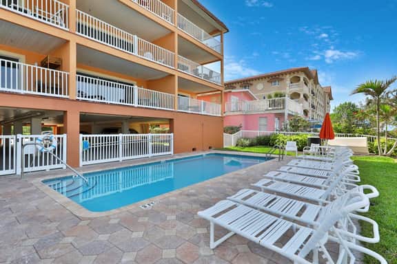 Oceanfront condo with WiFi pool and views walk to dining and attractions