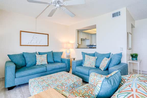 Delightful waterfront condo with sweeping views beach access balcony and pool