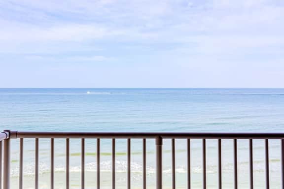 Delightful waterfront condo with sweeping views beach access balcony and pool