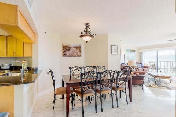 Sunny beachfront condo with pool access to beach attractions