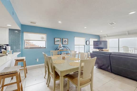 Coastal condo with sweeping Gulf views and wraparound balcony dogs welcome