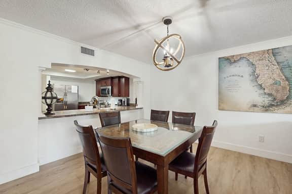 Modern cottage with peek a boo side Gulf view and beachfront heated pool and spa