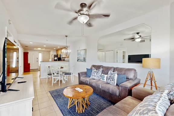 Second floor condo with beach access balcony pool hot tubs and ping pong