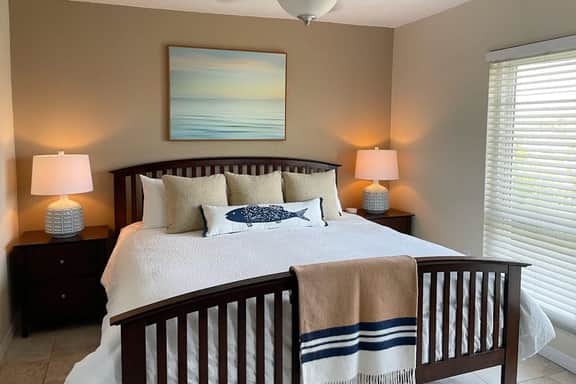 Snowbird friendly waterfront condo with WiFi hot tub heated pool and washer dryer