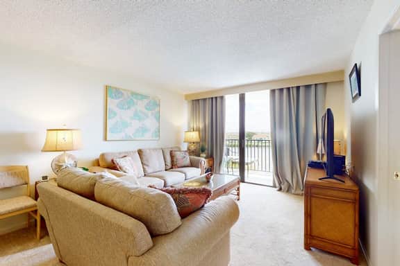 Waterfront condo with pool and spa directly across from wide beach