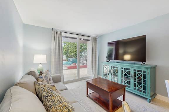 1st floor beachfront condo with outdoor pool with views AC and WD