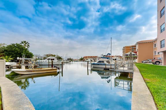Intracoastal view condo with pool hot tub and marina access walk to beach