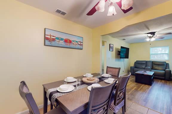 Cozy home with screened lanai foosball and fenced yard