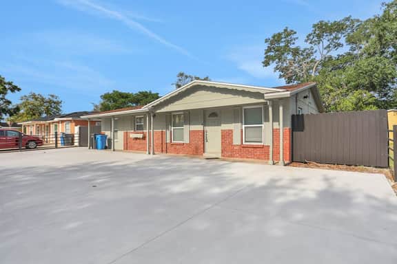 Cozy home with screened lanai foosball and fenced yard