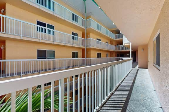 Beachfront condo with balcony pool hot tub grill and AC
