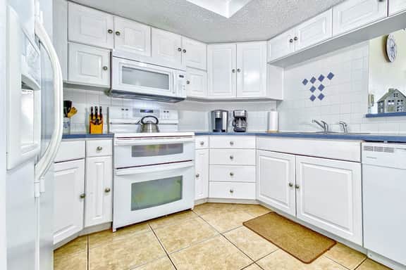 Beachfront coastal condo with private balcony WD on site pool and grills