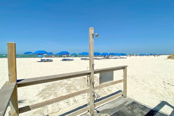 Newly renovated condo w private balcony gas grill and on site heated pool AC