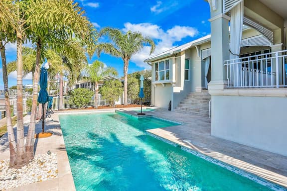 Exquisite Clearwater Retreat w Heated Pool Game Room Outdoor kitchen and Kayaks