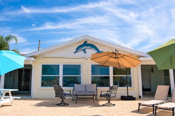 Gulf coast getaway with dock dolphins sunset views family friendly and WD