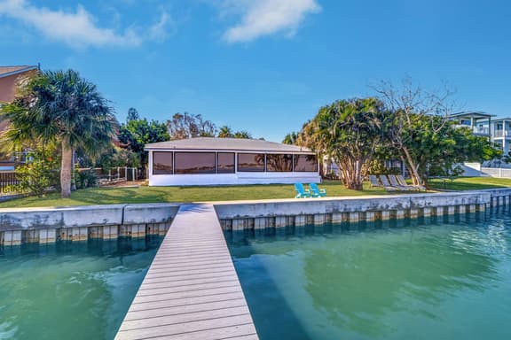 Waterfront home with deck garden WiFi and central AC dog friendly