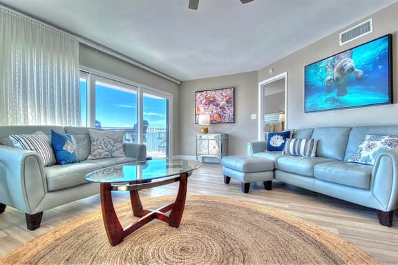 4th floor beachfront condo with private balcony views pool BBQ and AC