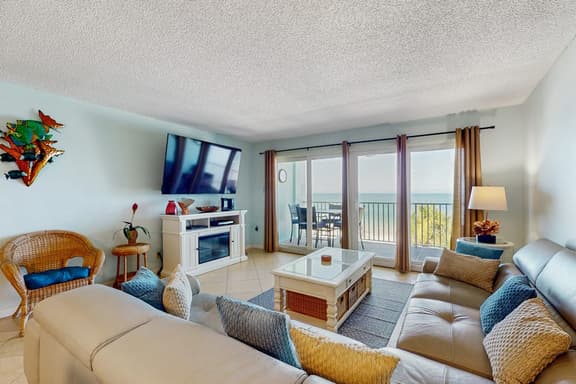 Oceanfront condo with heated pool hot tub and grills