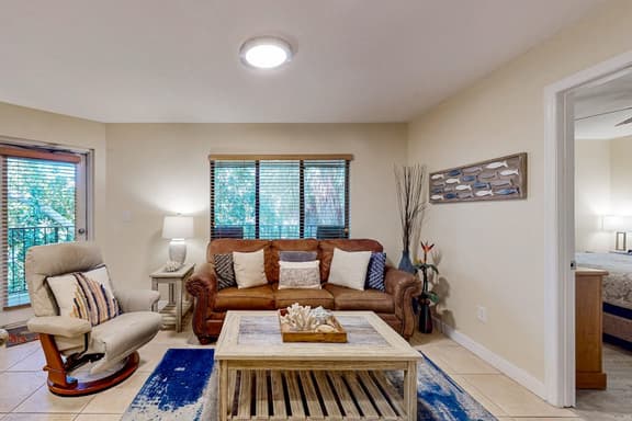 Top floor Condo with on site pool hot tub grills gym and private balcony