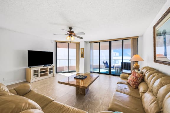 Beachfront condo with multiple balconies heated pool gym hot tub and AC
