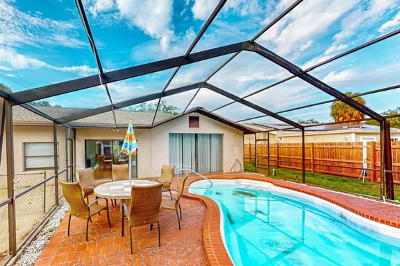 Conveniently located home with private pool patio foosball and private WD