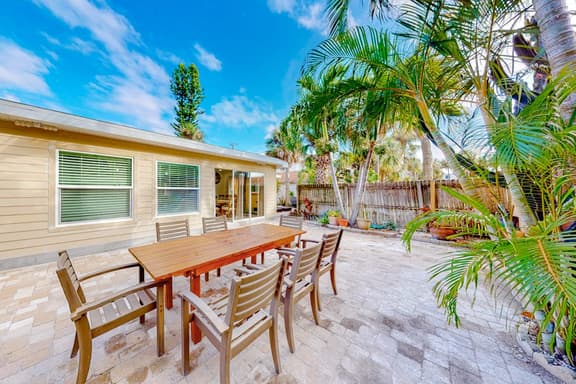 Fully renovated home with furnished patio washer dryer AC walk to the beach