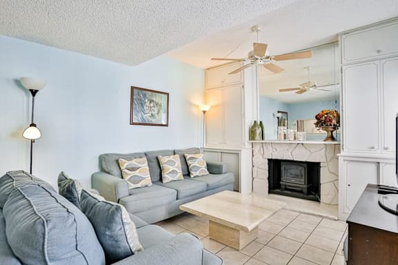 Water view condo with balcony heated pool and WD walk to beach
