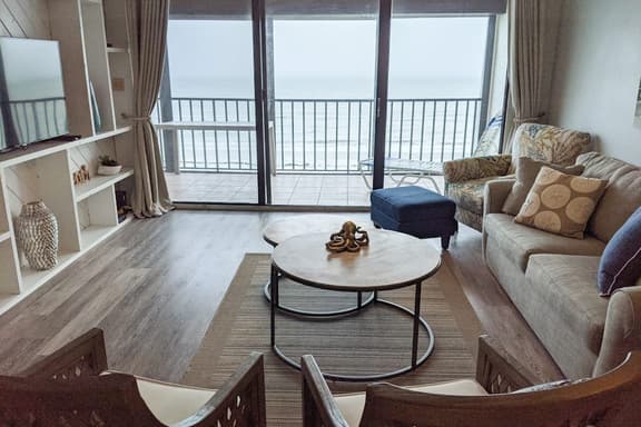 Beachside Haven with Private Balcony Free WiFi Washer Dryer Shared Pool Central AC