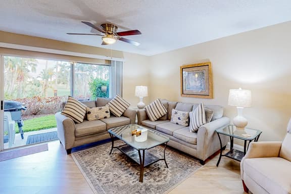 Ground floor condo with golf course views pool and beach access