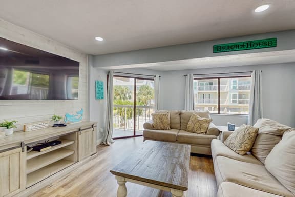 Gulf side condo with heated pool hot tub central AC and WD snowbird friendly