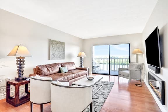 Elegant condo with water view near beach pool and hot tub fast WiFi and AC