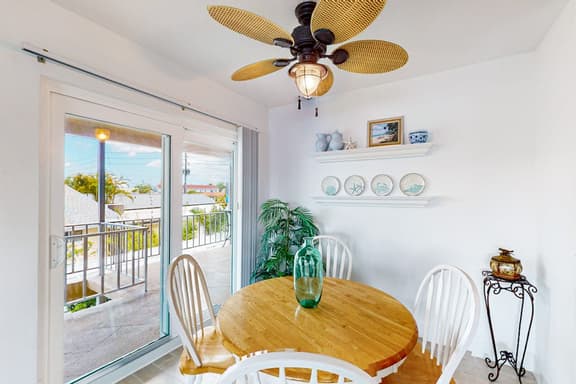 Bayfront 2nd floor condo in great location with water views dock WD balcony
