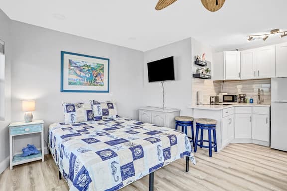 Beachfront studio with grilling area and shuffleboard steps to sand