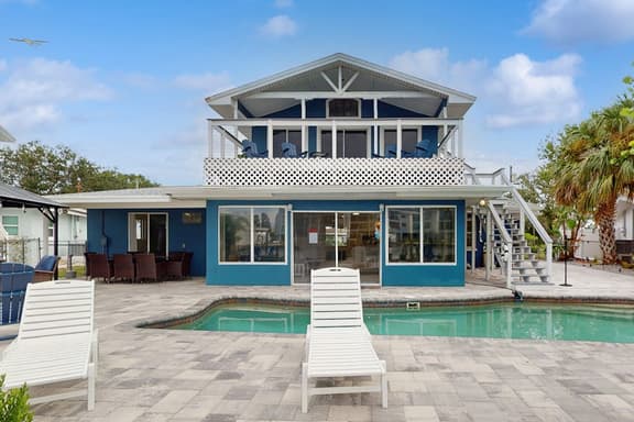Waterfront home with private pool deck and patio 1/2 mile to the beach