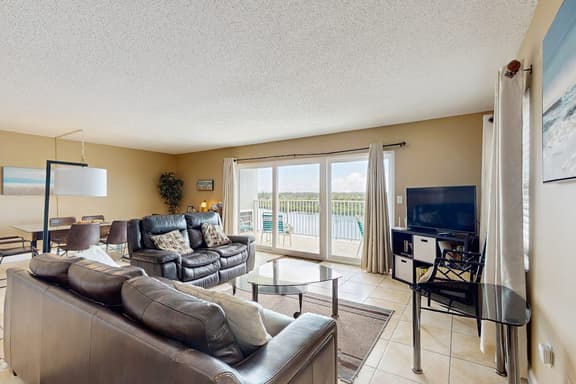 Water view condo with heated Gulf front private balcony and central AC