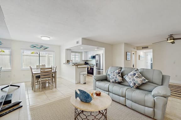 Ground floor getaway with a heated pool and central AC walk to the beach