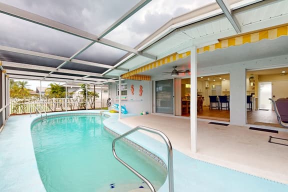 Canal front home with private pool dock grill canal views and WD