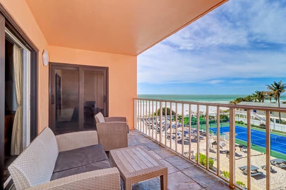 Waterfront condo with pool hot tub tennis and beach access