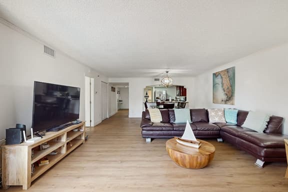 Modern cottage with peek a boo side Gulf view and beachfront heated pool and spa