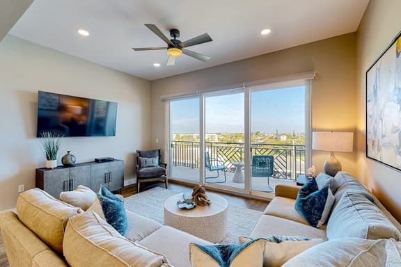 Brand new condo steps to beach with balcony heated pool and hot tub dog friendly