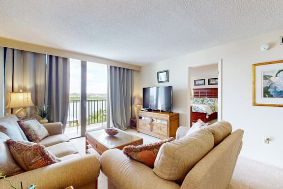Waterfront condo with pool and spa directly across from wide beach