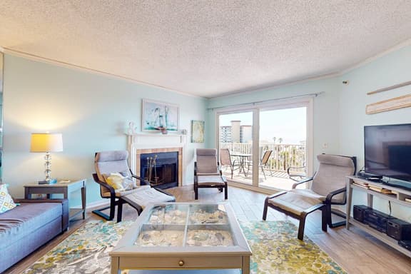 Seashore getaway with partial Gulf view and beachfront heated pool and spa