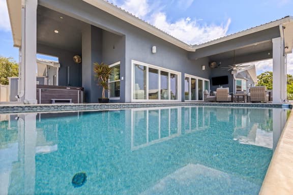 Modern indulgence with media room expansive waterway views AC WD and Wifi