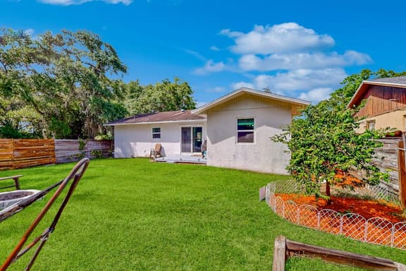 Dog friendly home with fenced yard firepit washer dryer and central AC