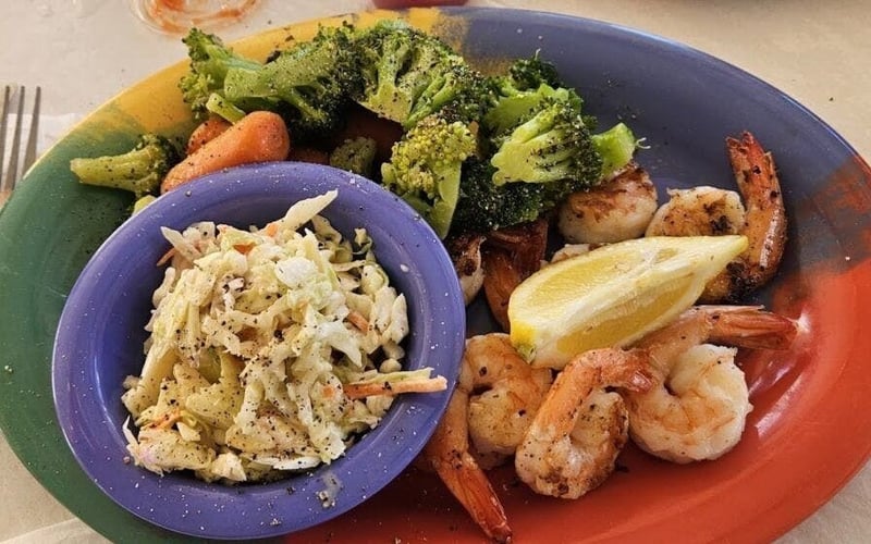 Grilled shrimp with broccoli and coleslaw at Frenchy's Rockaway Grill